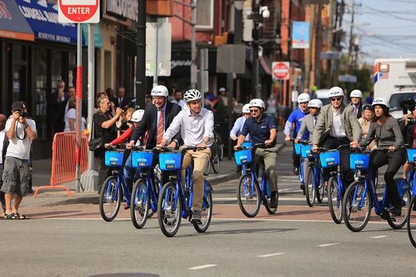 Jersey City, NJ Mayor and his staff using bicycle rentals to demonstrate the desired behavior.